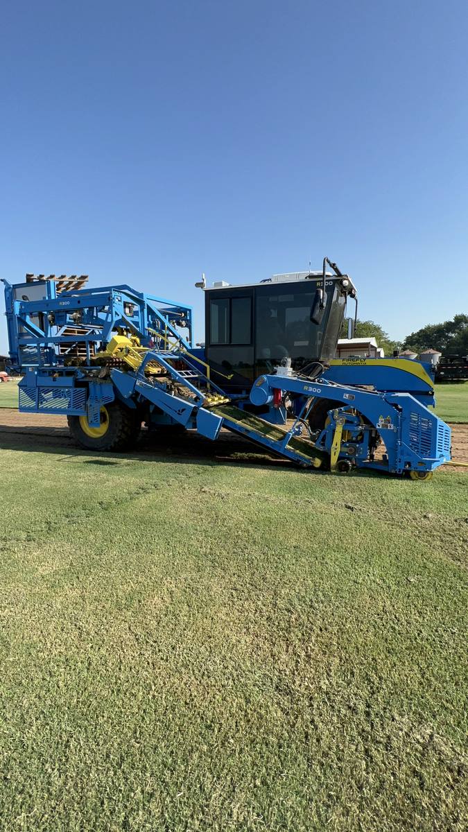 FireFly Automatix harvester cutting a strip of sod